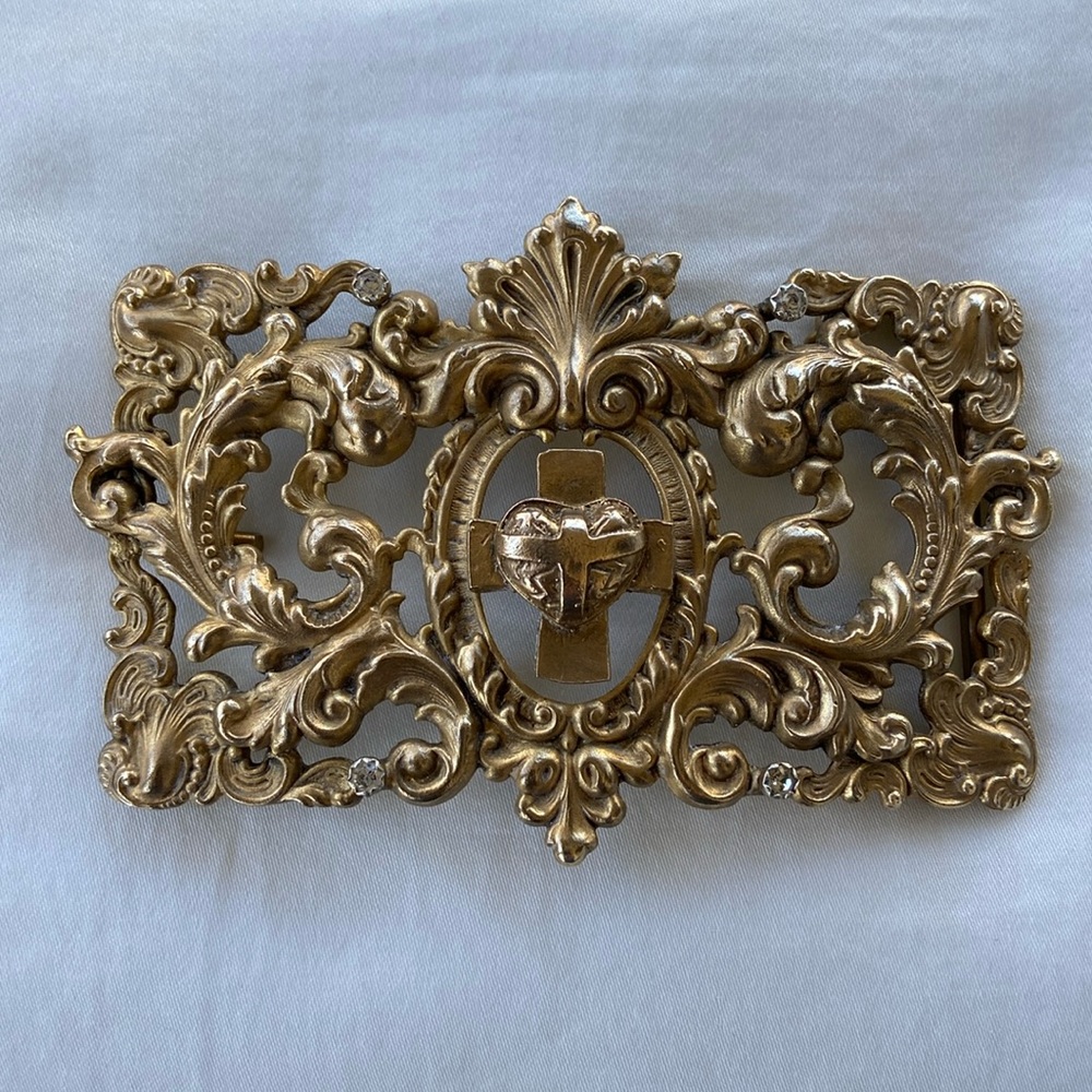 Virgins Saints and Angels gold belt buckle